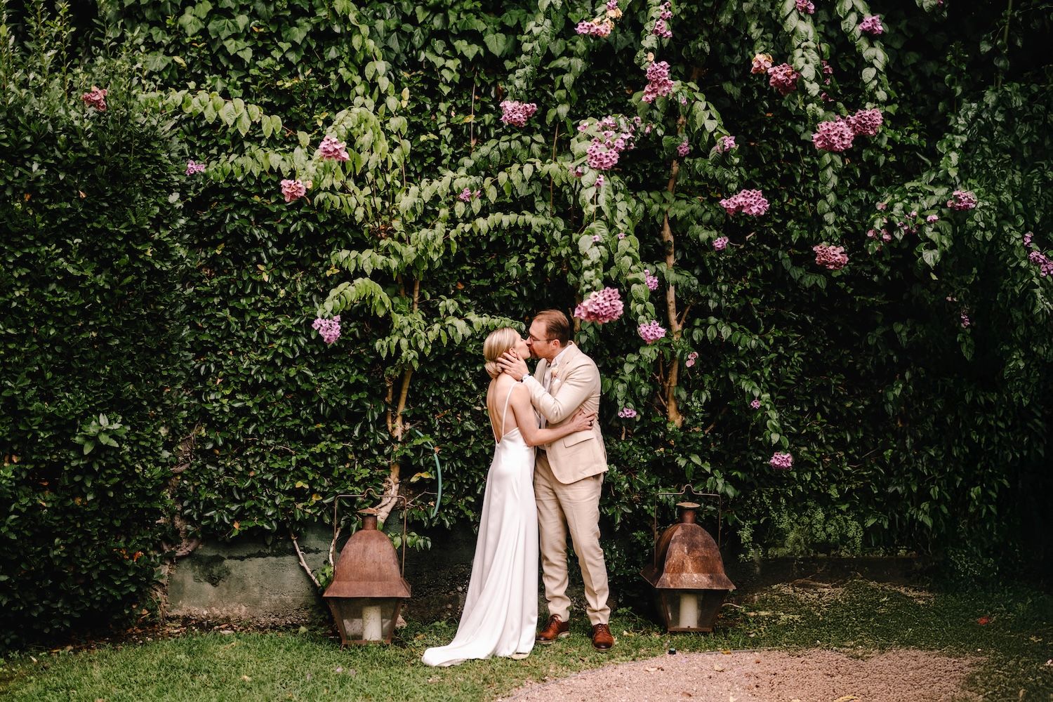 Finnish bride and groom during their romantic photo session in the lush hotel gardens