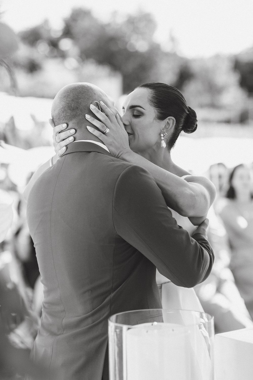 Bride and groom embracing in the Cape Winelands during an elegant editorial wedding