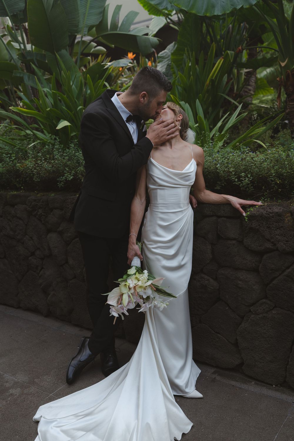 Bride and Groom kissing 1 Hotel Hanalei Bay