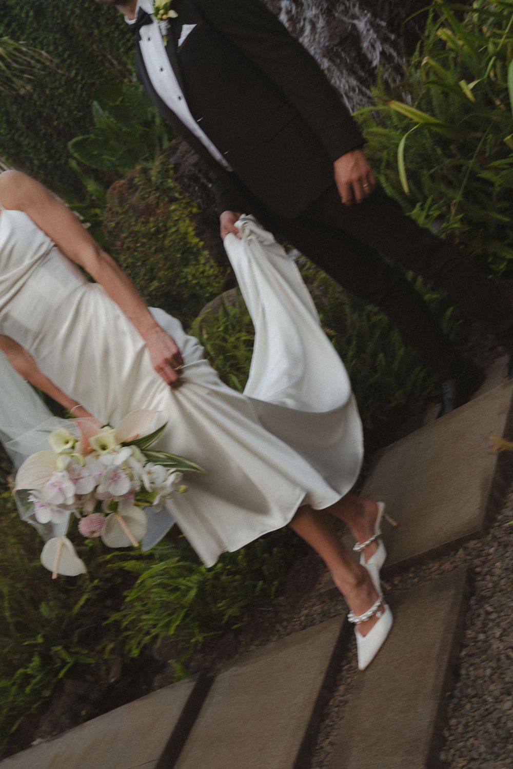 Bride and Groom walking 1 Hotel Hanalei Bay
