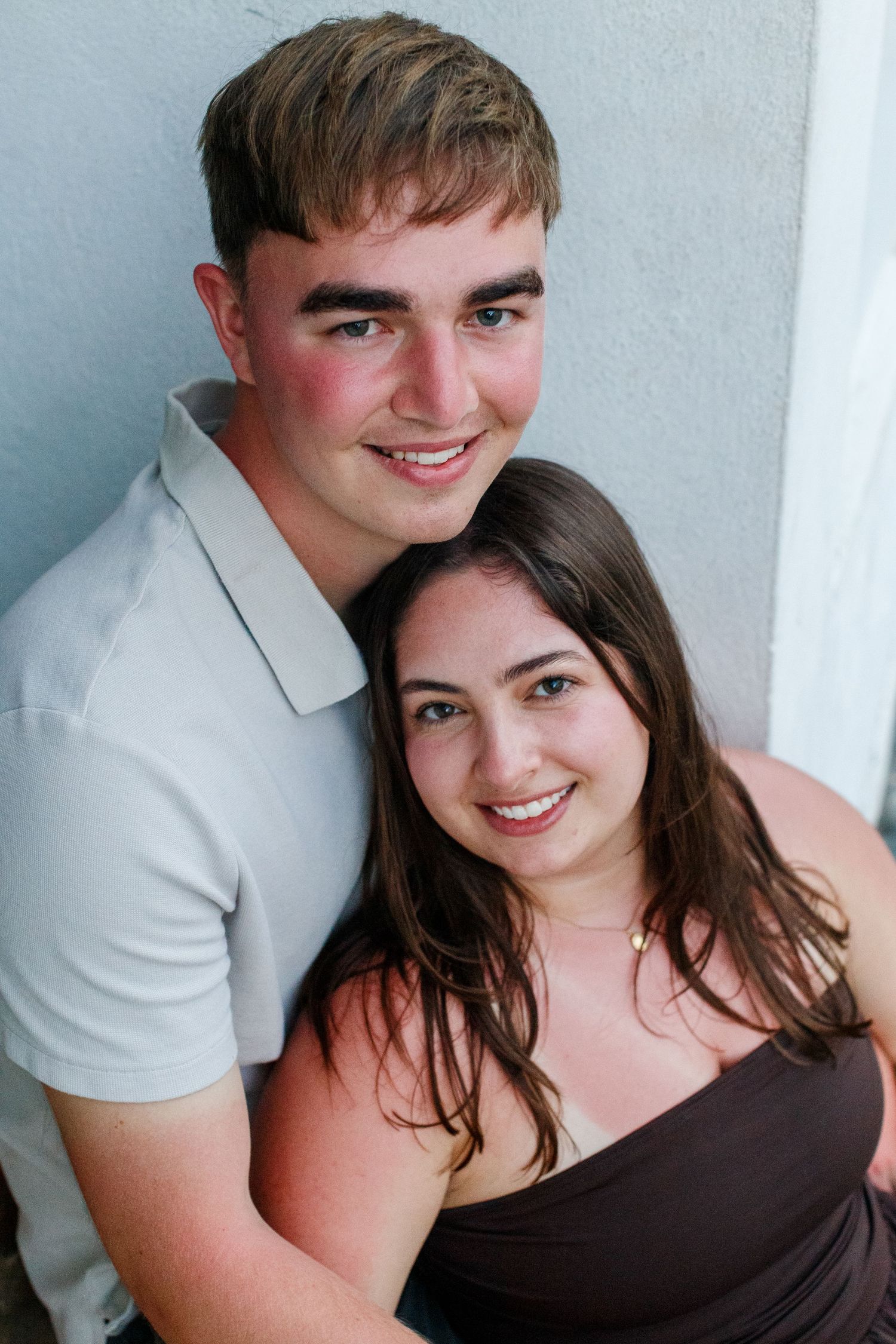 Couples portrait sitting on steps in Old San Juan, Puerto Rico.