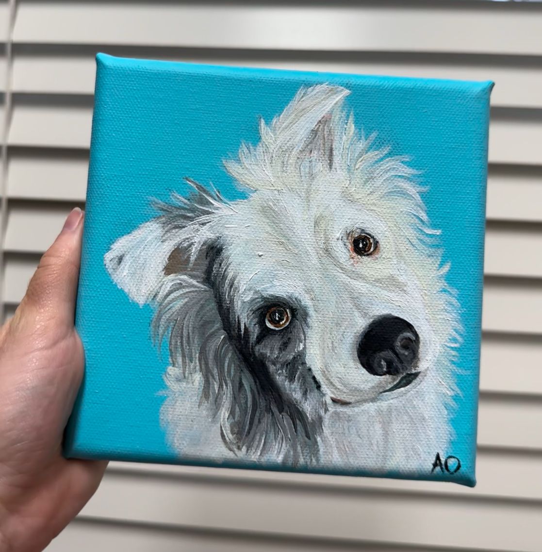 Canvas painting of a white fluffy dog portrait against turquoise background.