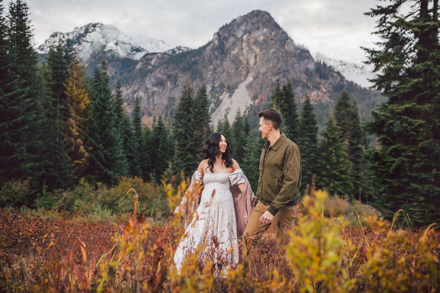 Couple standing together during their adventure and maternity photoshoot at Snoqualmie Pass near Seattle, Washington