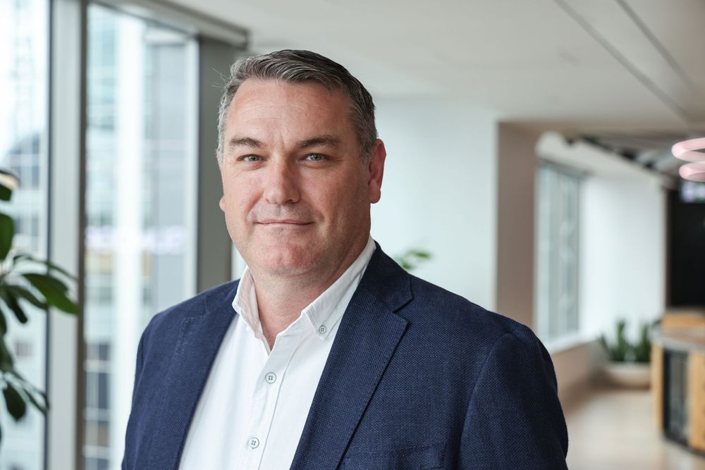 Rob Klenner in an engaging headshot/portrait taken at Suncorp HQ, Auckland by photographer, actress,  artist Amanda Billing.