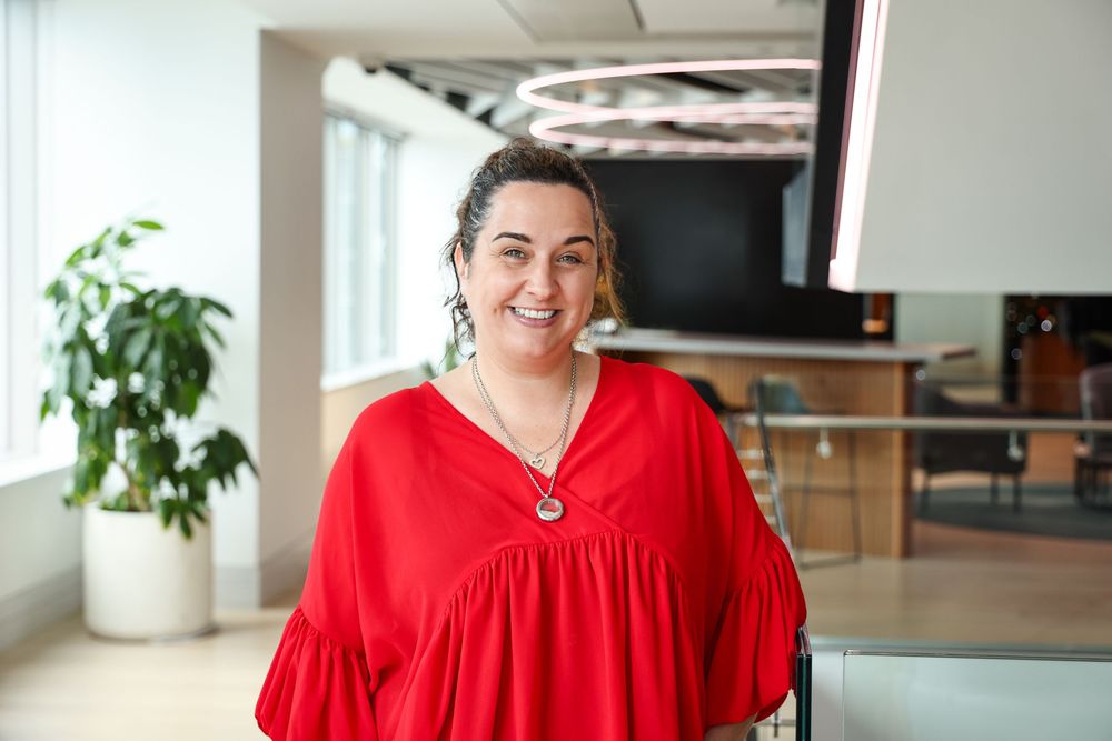 Shelley Messent in an engaging headshot/portrait taken at Suncorp HQ, Auckland by photographer, actress,  artist Amanda Billing.
