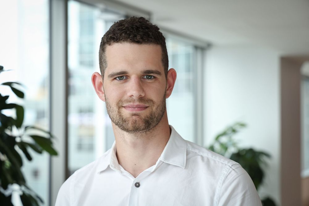Spencer Hampson in an engaging headshot/portrait taken at Suncorp HQ, Auckland by photographer, actress,  artist Amanda Billing.