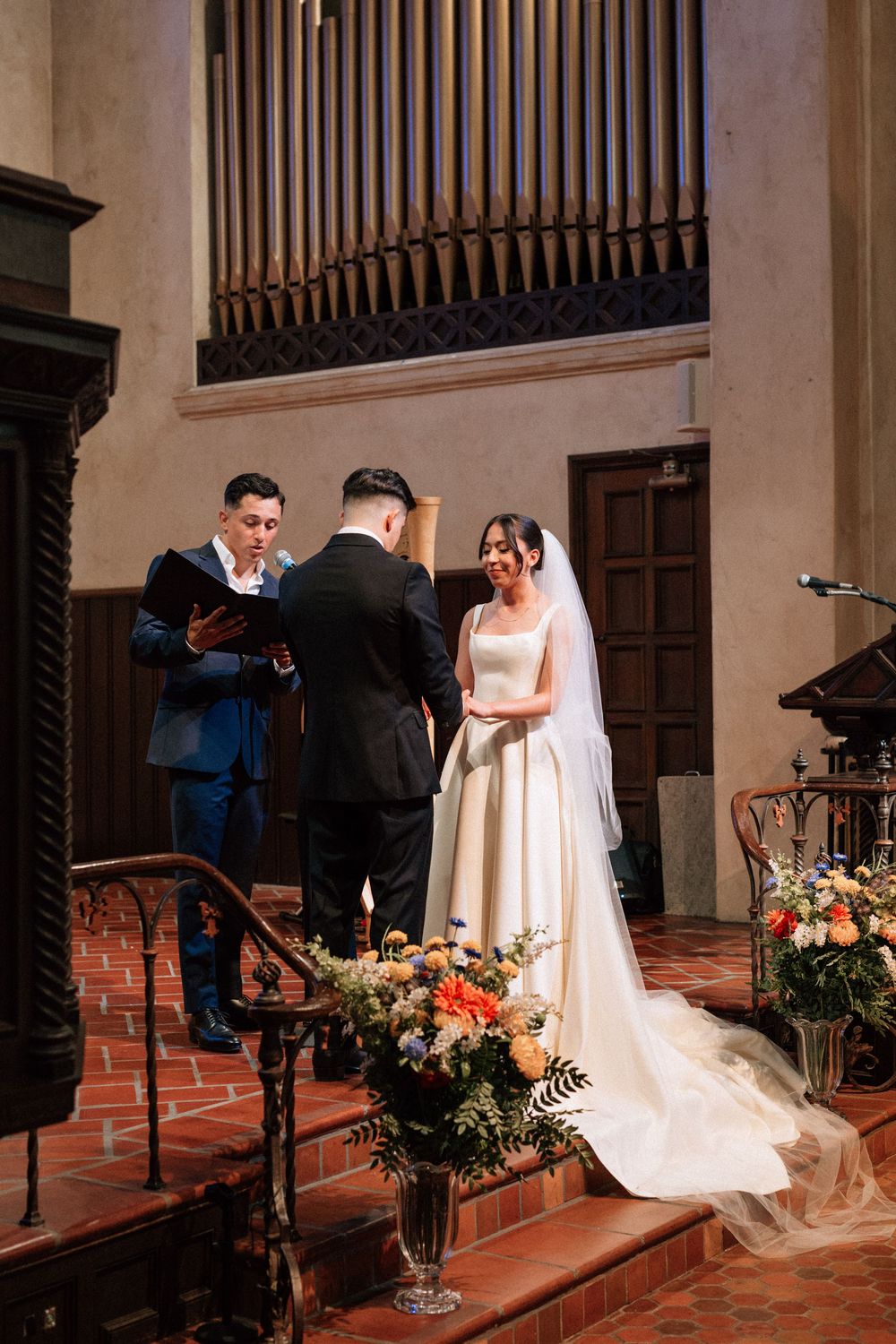 A portrait of the bride exchanging vows with her almost husband in a digital photograph by Santa Barbara wedding photographer.