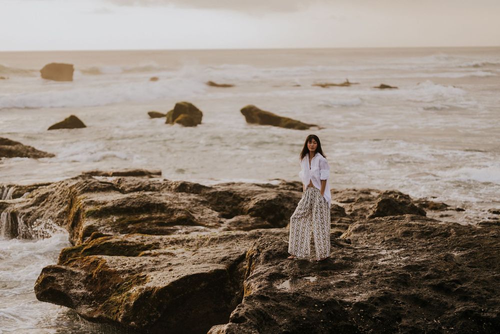 Lifestyle fashion photography in Bali with sunset beach