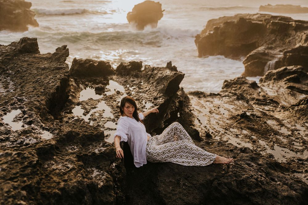 Lifestyle fashion photography in Bali with sunset beach
