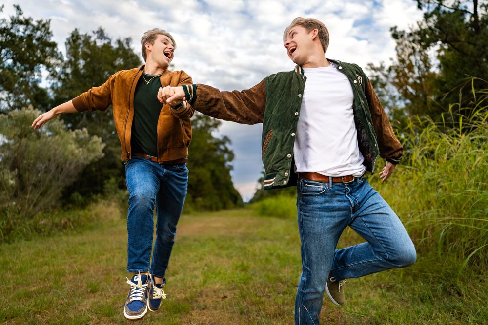 Energetic action shots of people jumping and playing on grassy outdoor hill.