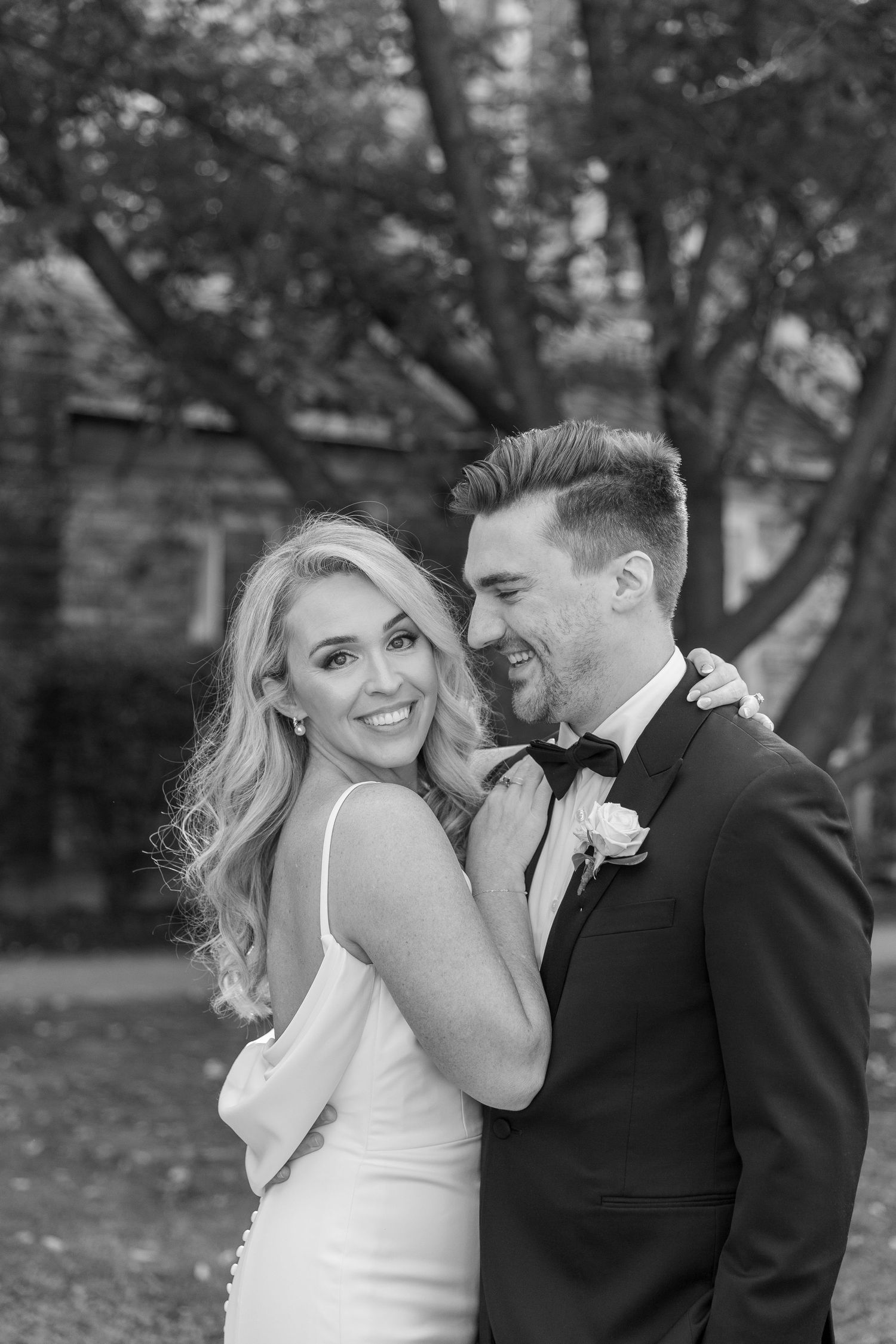 A romantic black and white photo series of a couple sharing intimate moments during their outdoor wedding photoshoot. NASHVILLE WEDDING PHOT