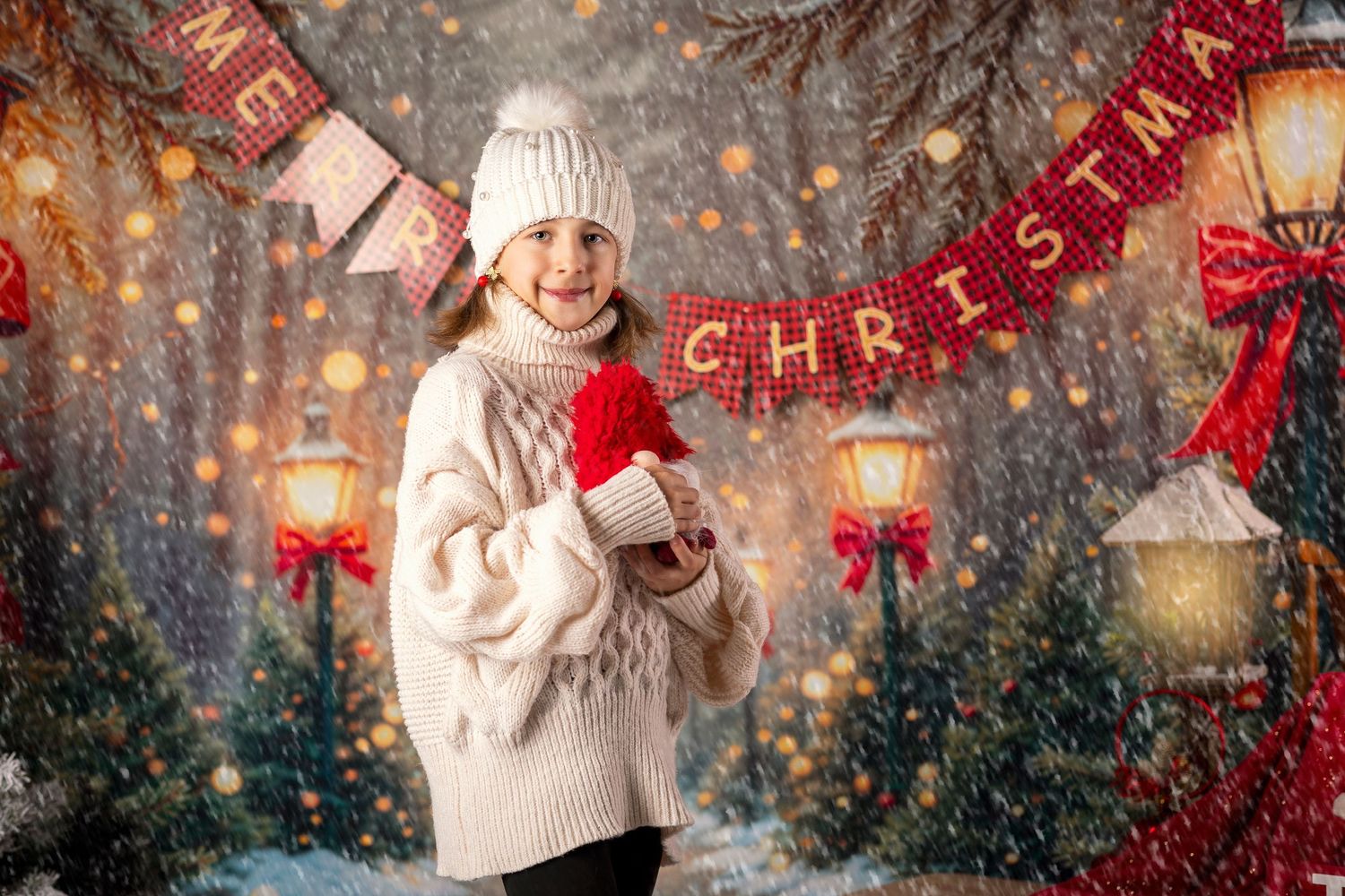 LIttle girl iswith a festive cup of hot chocolate in front of the christmas trees