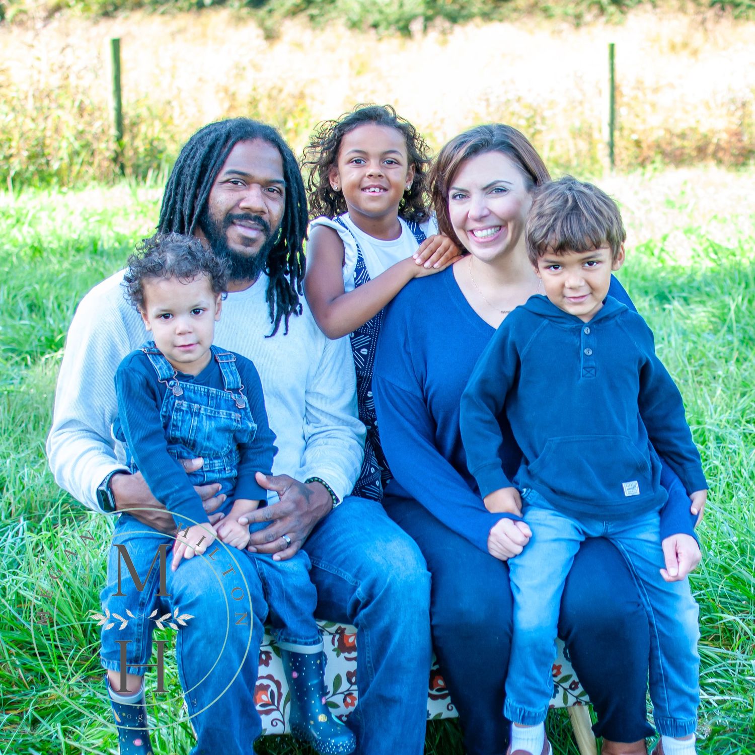 Family of 5 sitting outdoor photo image