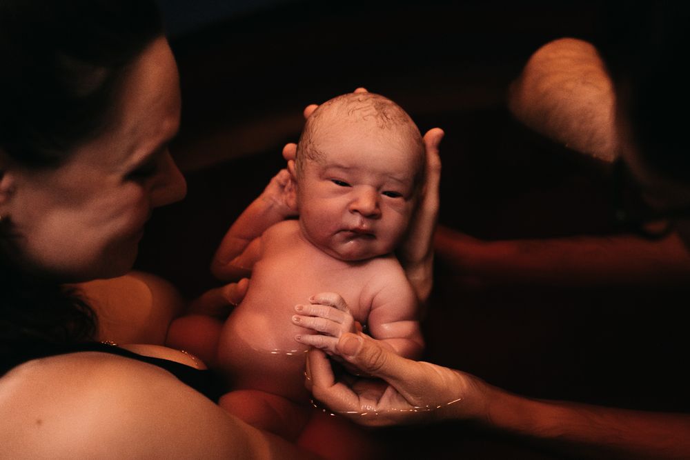 Home birth Brisbane Birth Photography in safe space with doula and husband support