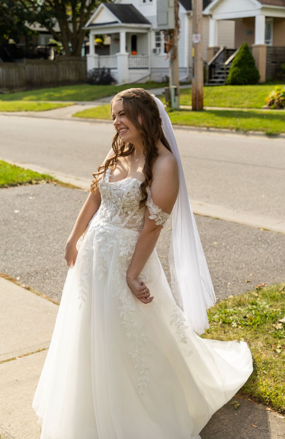 bride showing off her final look