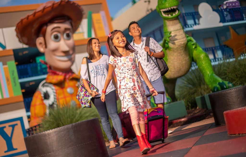 Toy Story-themed entrance at Disney World with colorful characters and decorations.
