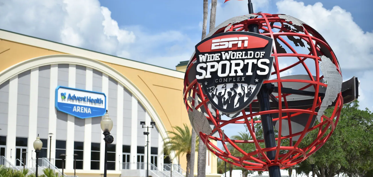 ESPN Wide World of Sports complex entrance with large red spherical logo structure.