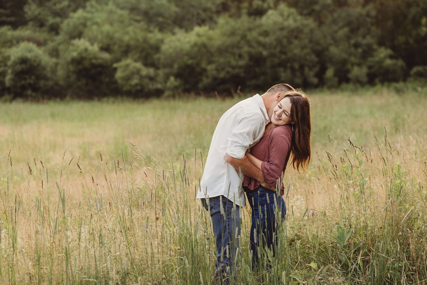 Professional photo of a couple in the tall grass