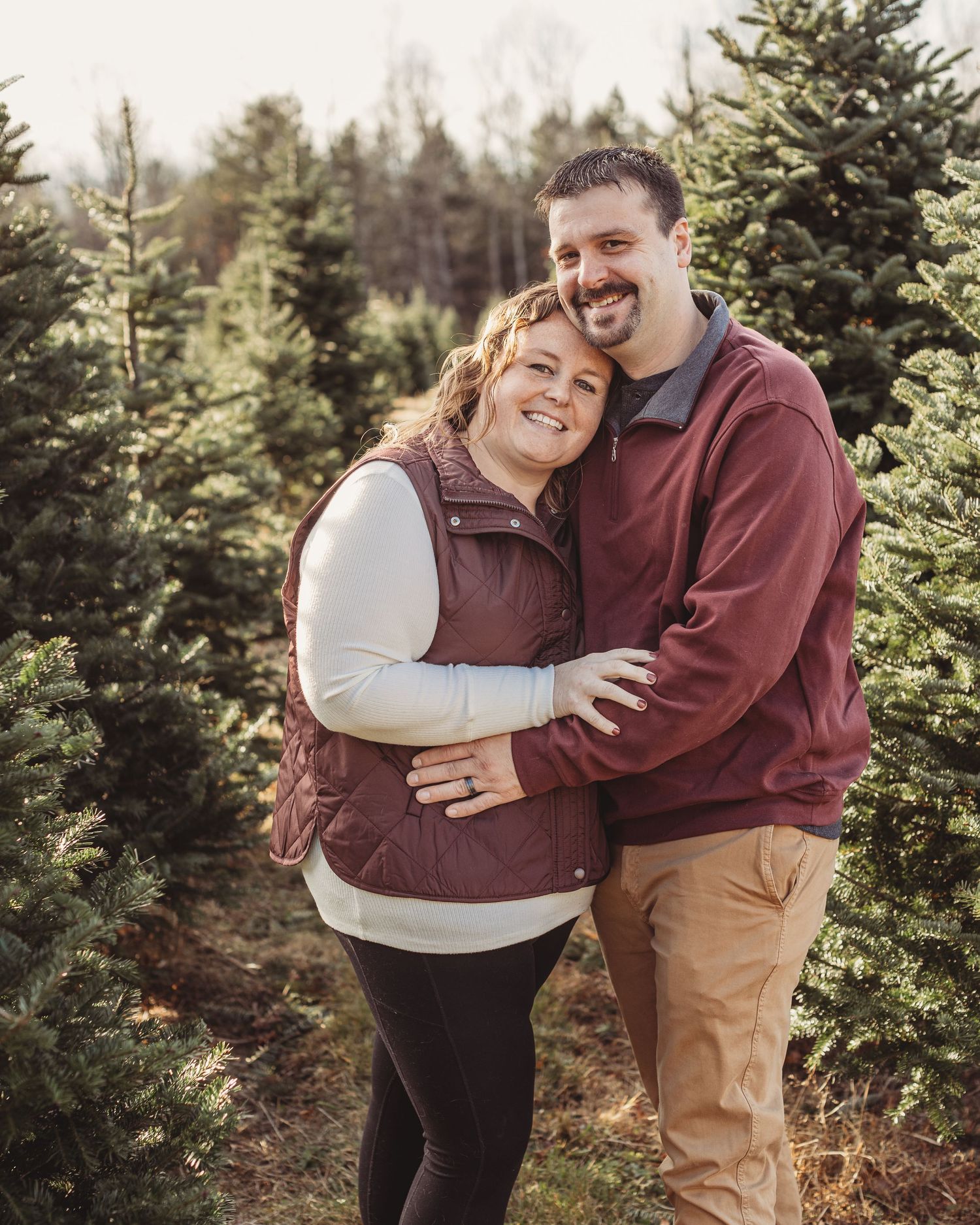 Professional photo of a couple at a treefarm