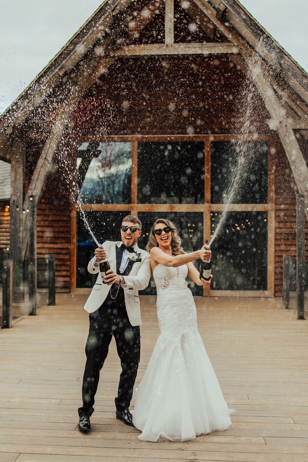 Sequence of dance poses during a snowy celebration at a rustic wooden chapel venue.