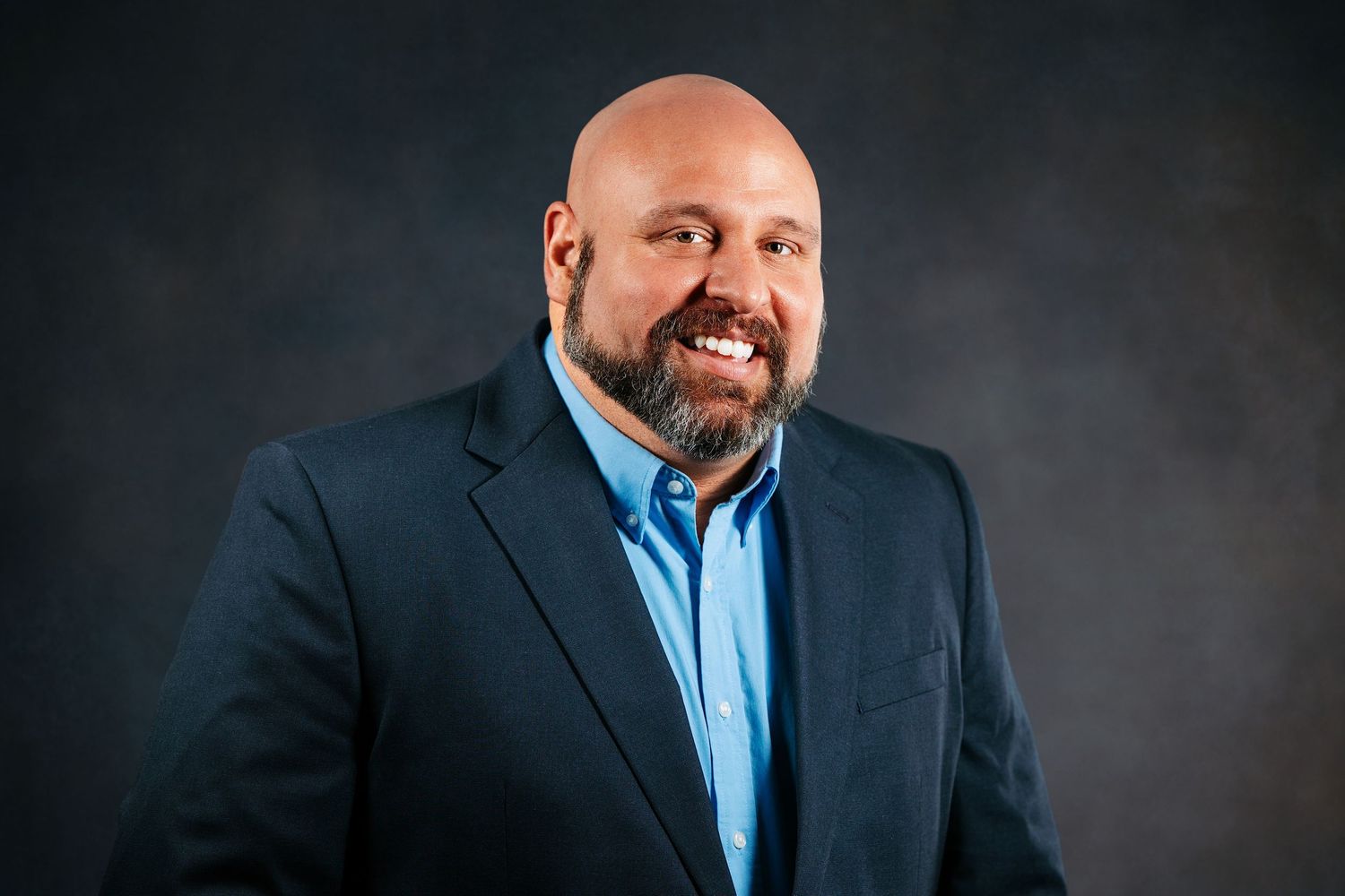 Professional LinkedIn headshot of a business professional in Middle Tennessee with polished studio lighting