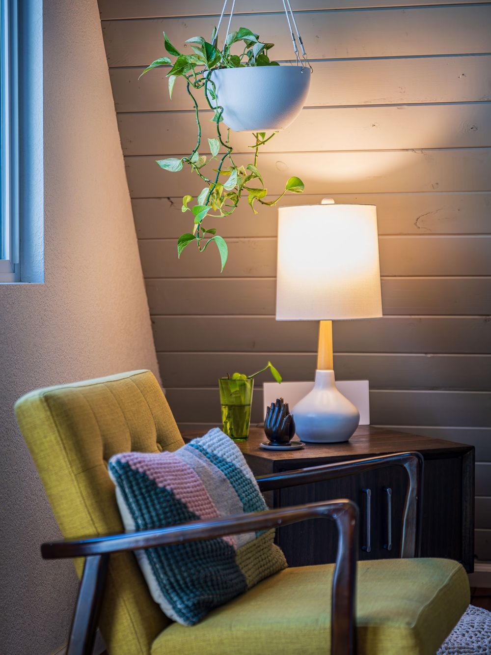 Detail shot of chair, plant and lamp at the Hygge Chalet by Denver Hospitality, Travel & Tourism photographer Captain Colorado Photography.