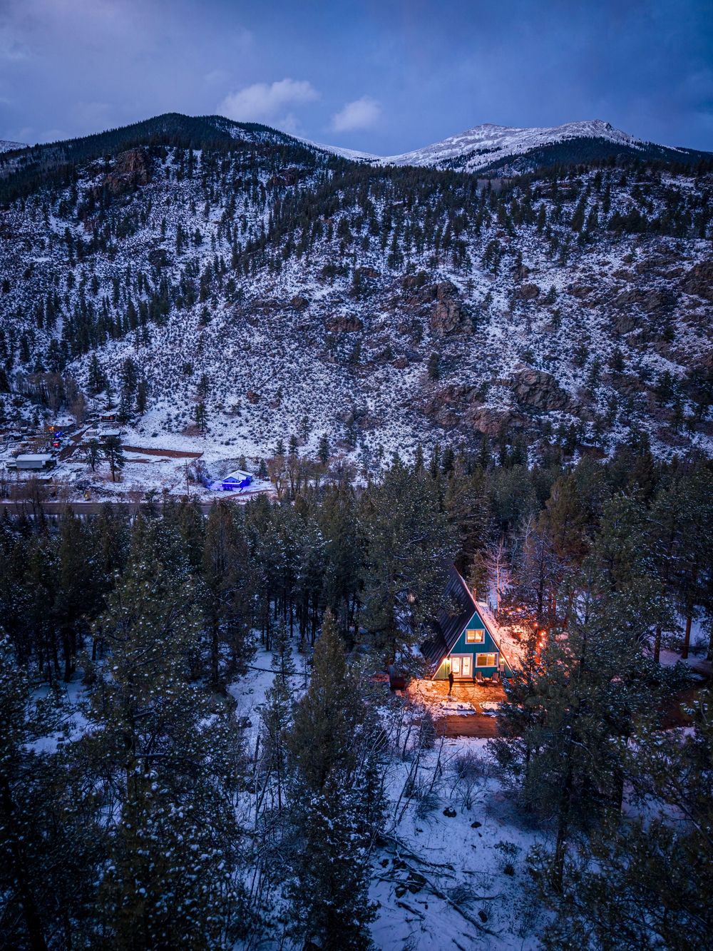 Aerial shot the Hygge Chalet at night by Denver Hospitality, Travel & Tourism photographer Captain Colorado Photography.