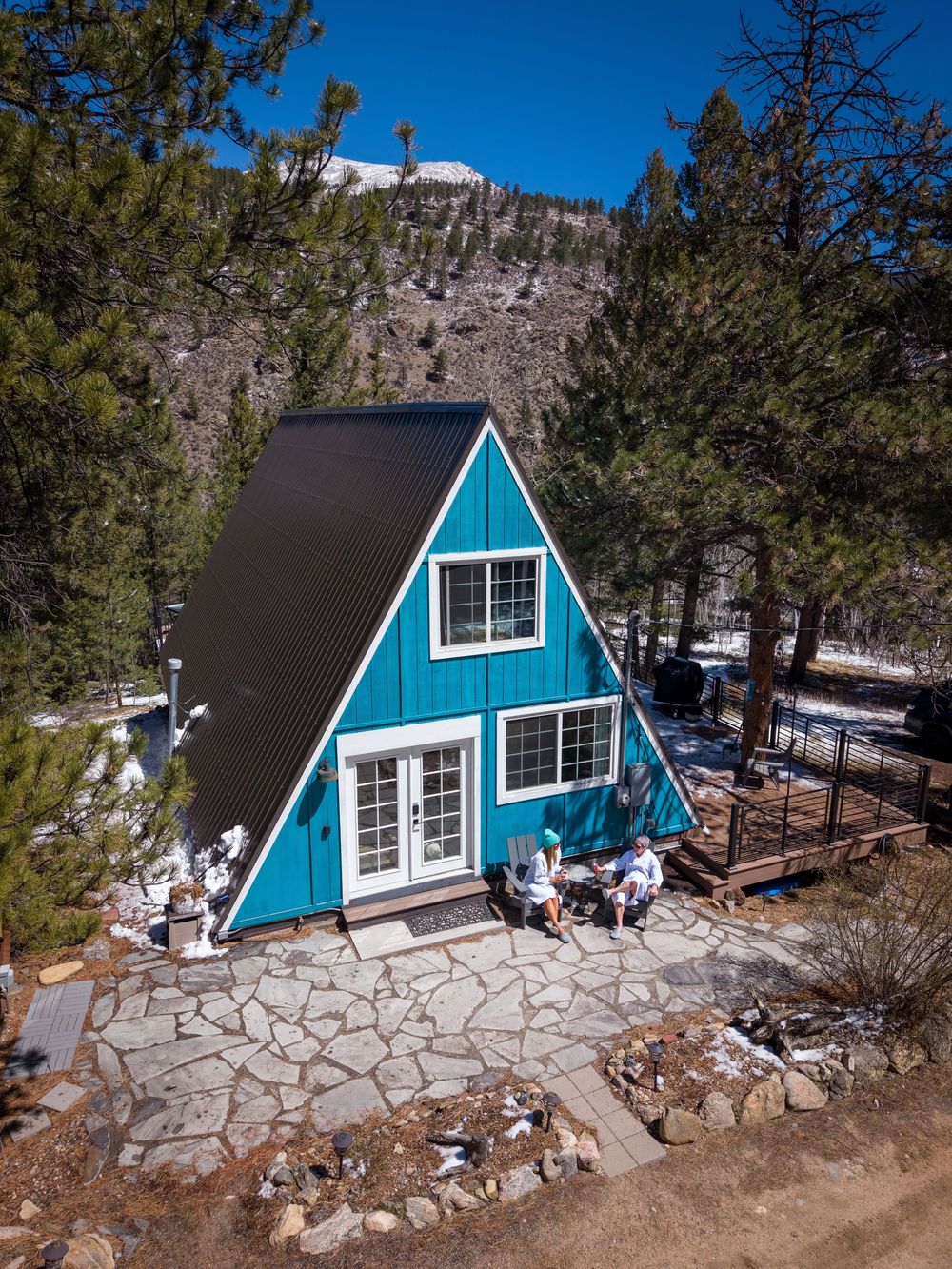 Aerial shot of a couple relaxing at the Hygge Chalet by Denver Hospitality, Travel & Tourism photographer Captain Colorado Photography.