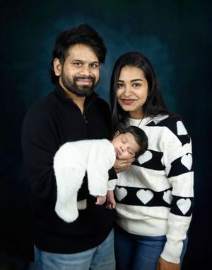 Frisco and covering all of Dallas TX family photography session by Bhaire Photography, capturing laughter and interaction in studio.