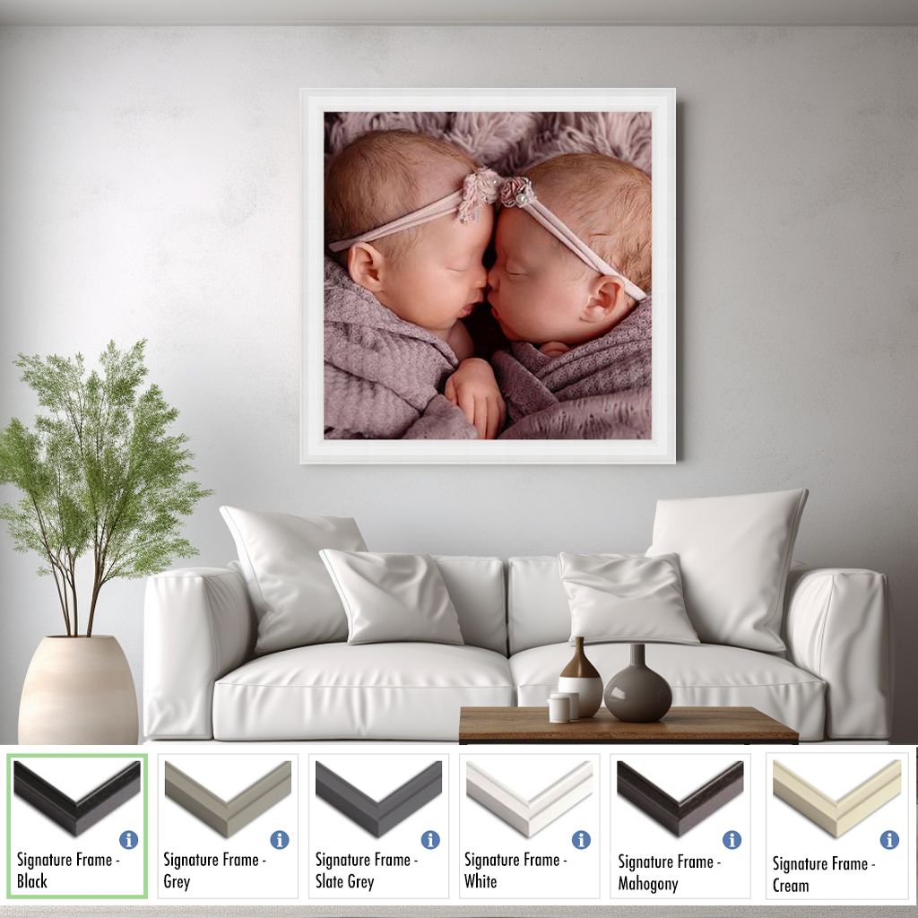 Modern bedroom interior with gray walls, white sofa, and decorative wall art featuring fabric sample swatches below.
