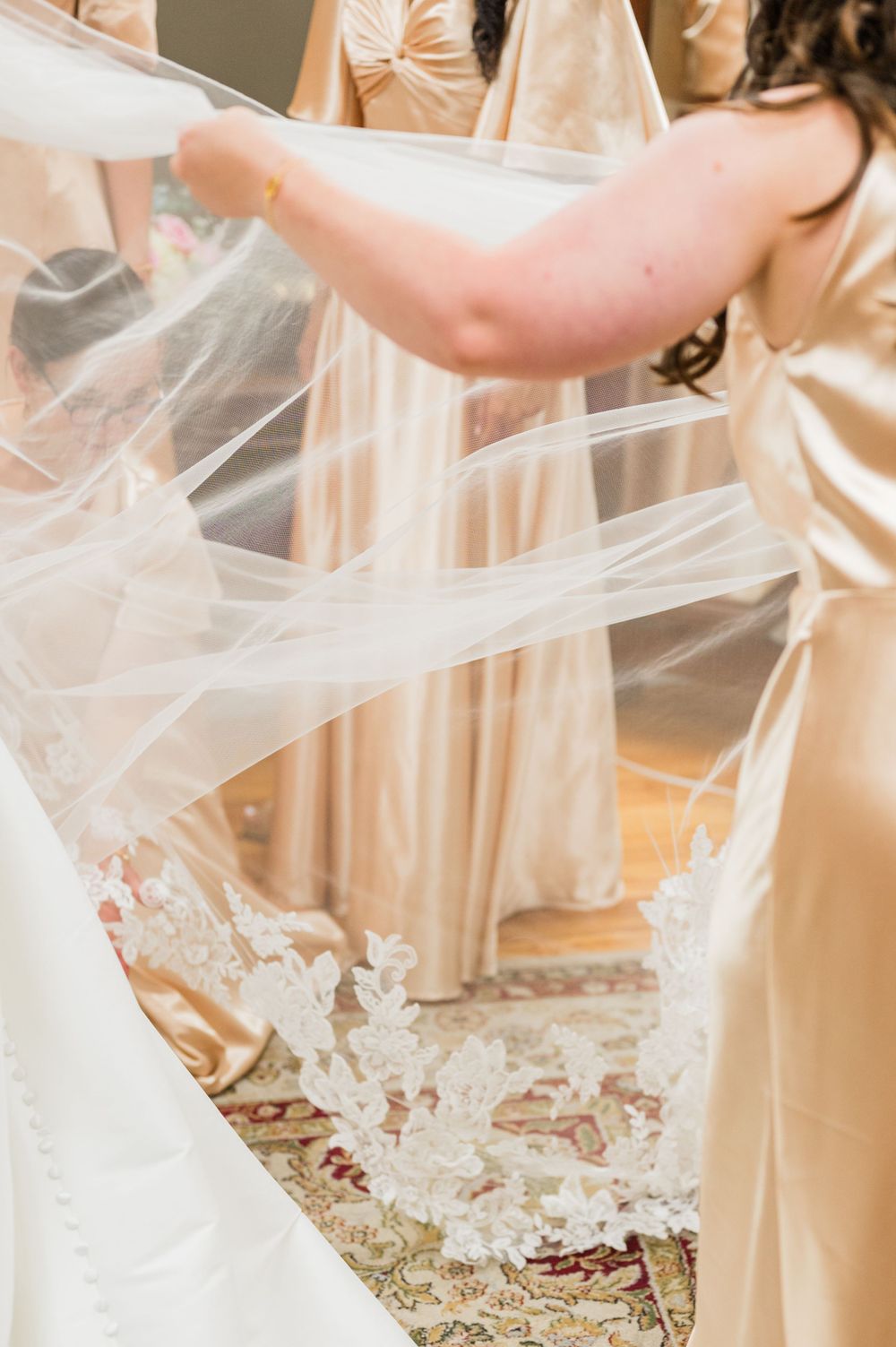 Bride getting ready for her Traditional Latin Mass wedding at Holy Family Cathedral in Tulsa, Oklahoma.