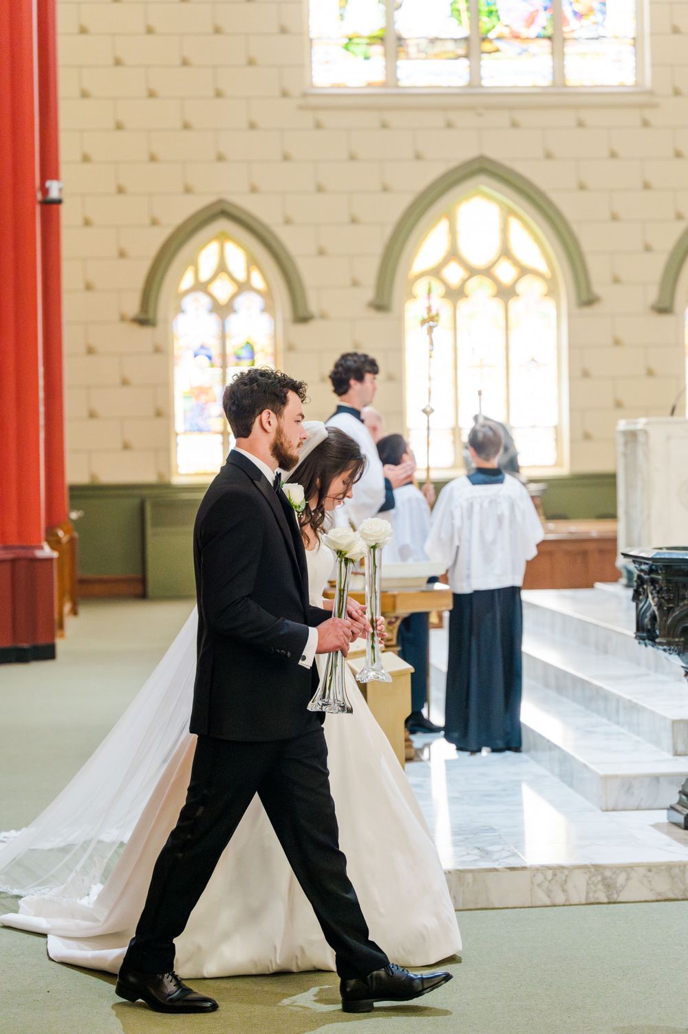 Bride and groom during their Traditional Latin Mass wedding at Holy Family Cathedral in Tulsa, Oklahoma.