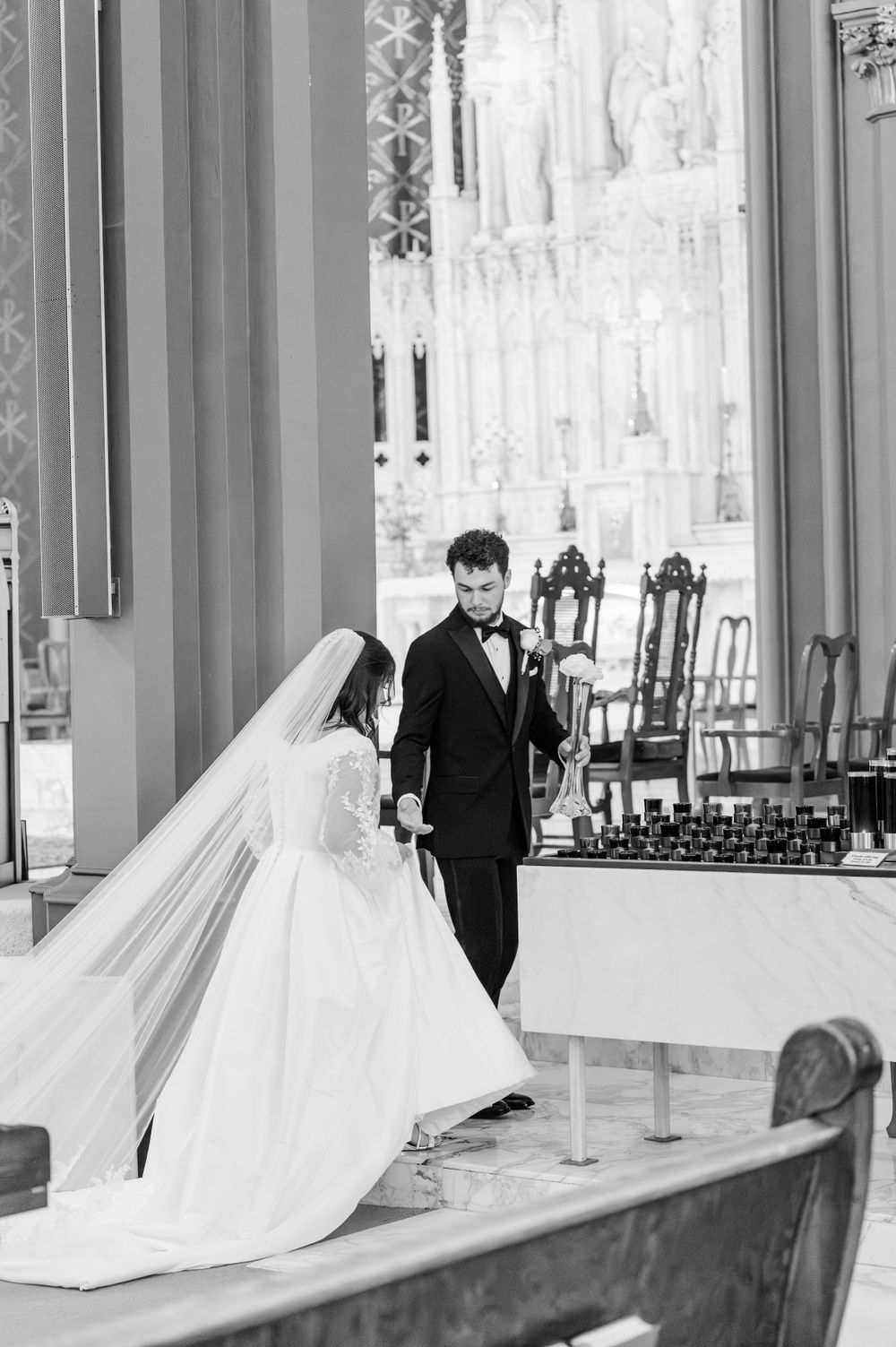 Bride and groom during their Traditional Latin Mass wedding at Holy Family Cathedral in Tulsa, Oklahoma.