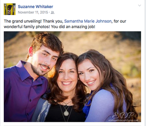A family poses together outdoors for a casual portrait photo during golden hour lighting.