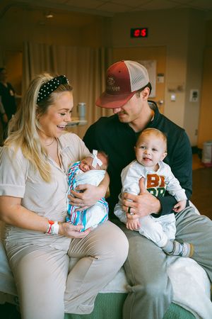 Family bonding moments captured in a series of casual hospital room photos.