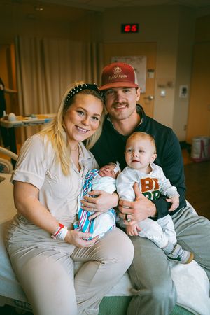 Candid shots of new parents interacting with their baby in a medical setting.
