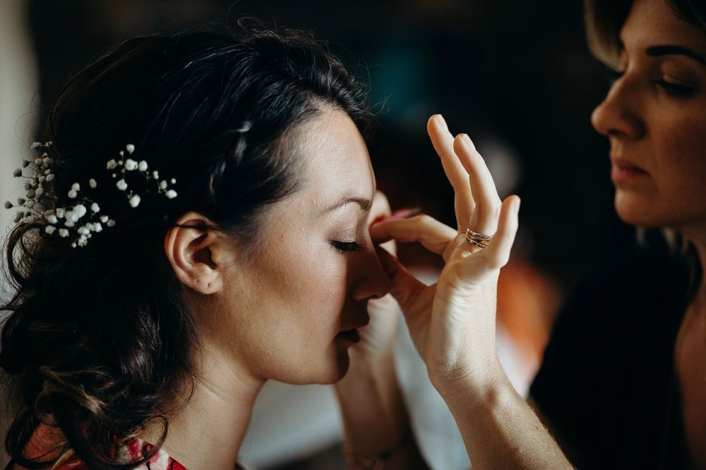 A romantic wedding photo collage showing intimate close-up moments between a couple during their special day.