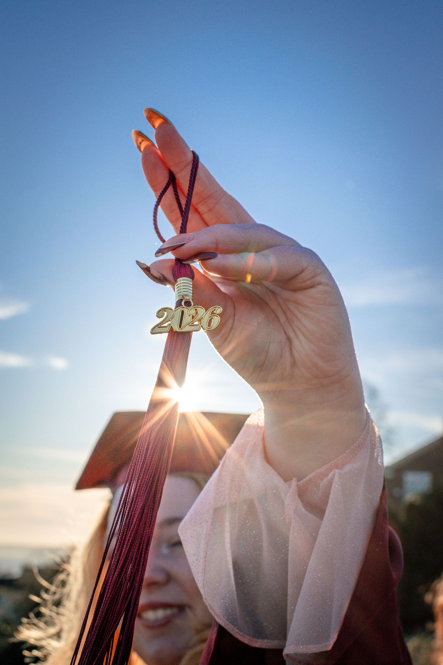 Close-up of graduation tassel during Seattle senior photo session