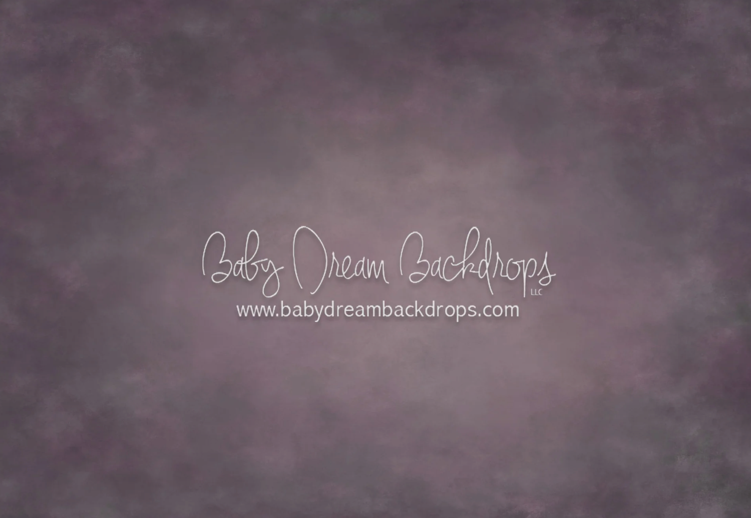 A textured dark purple and gray mottled photography backdrop with a watermark from Baby Dream Backdrops.