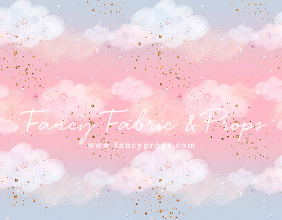 Pink and white watercolor clouds with gold glitter sparkles on a dreamy pastel background.