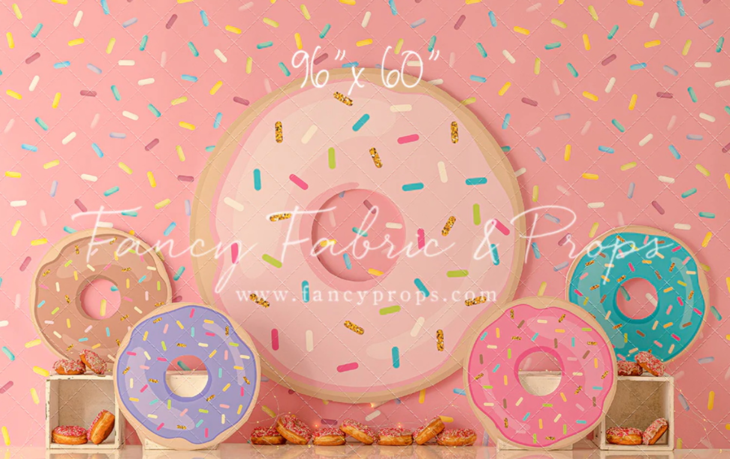 Pink frosted donuts with colorful sprinkles arranged in a row on a light background with text overlay.