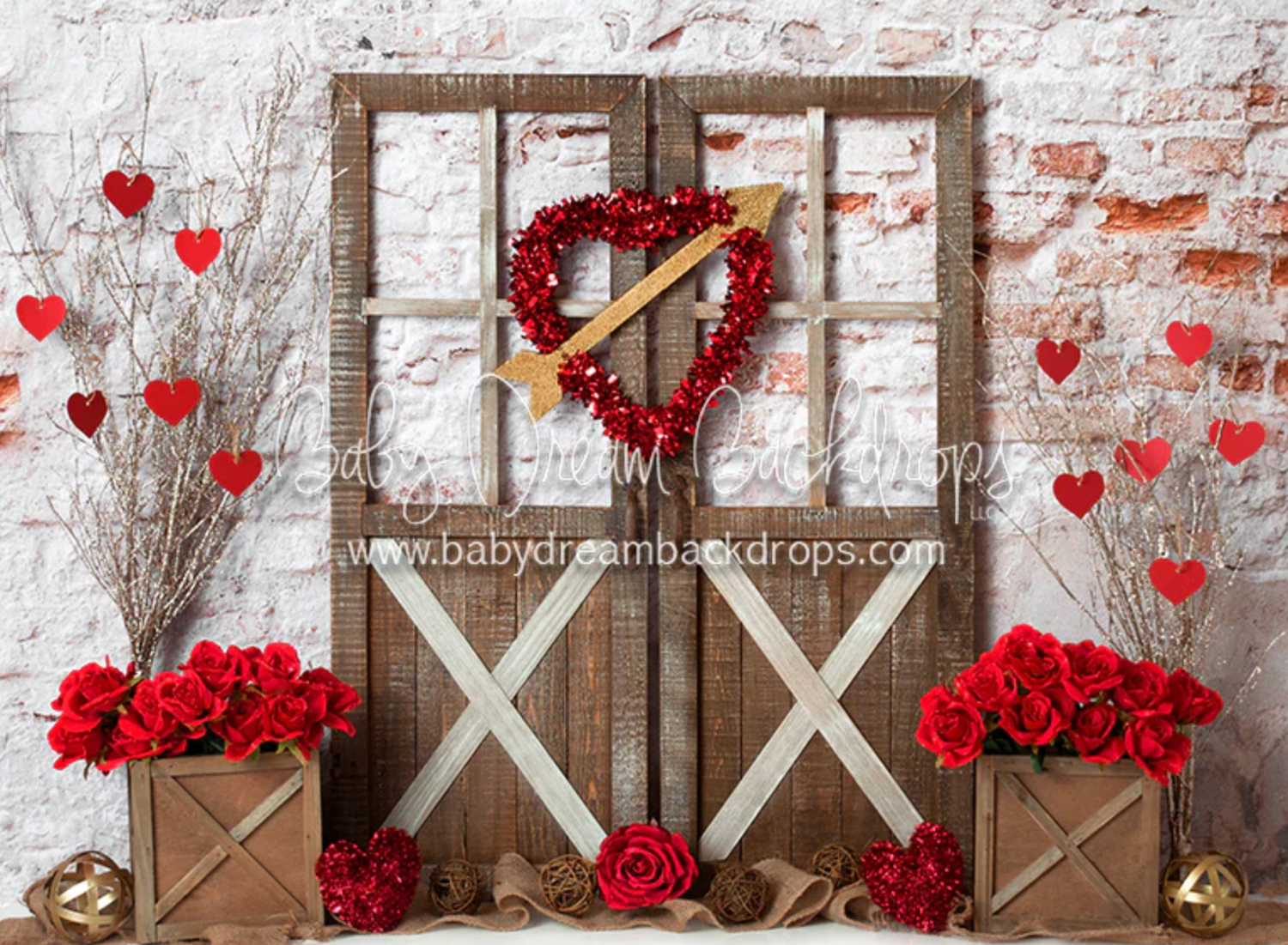 Red roses and heart decorations adorn a rustic white brick wall with wooden cross details.