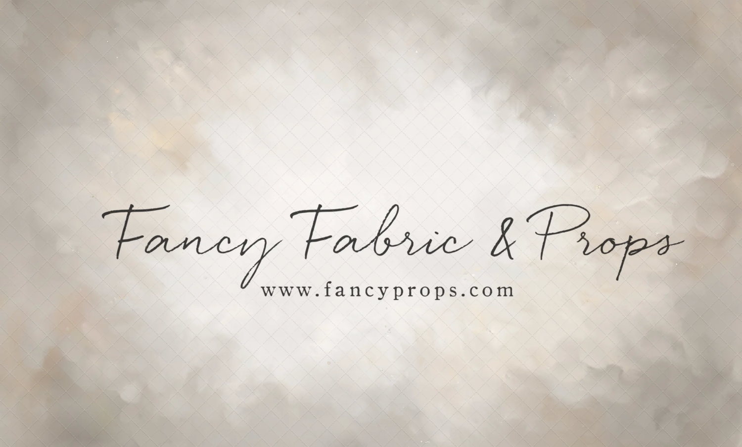 A rustic brown textured banner with elegant text reading 'Fancy Fabric & Props' and a website URL.