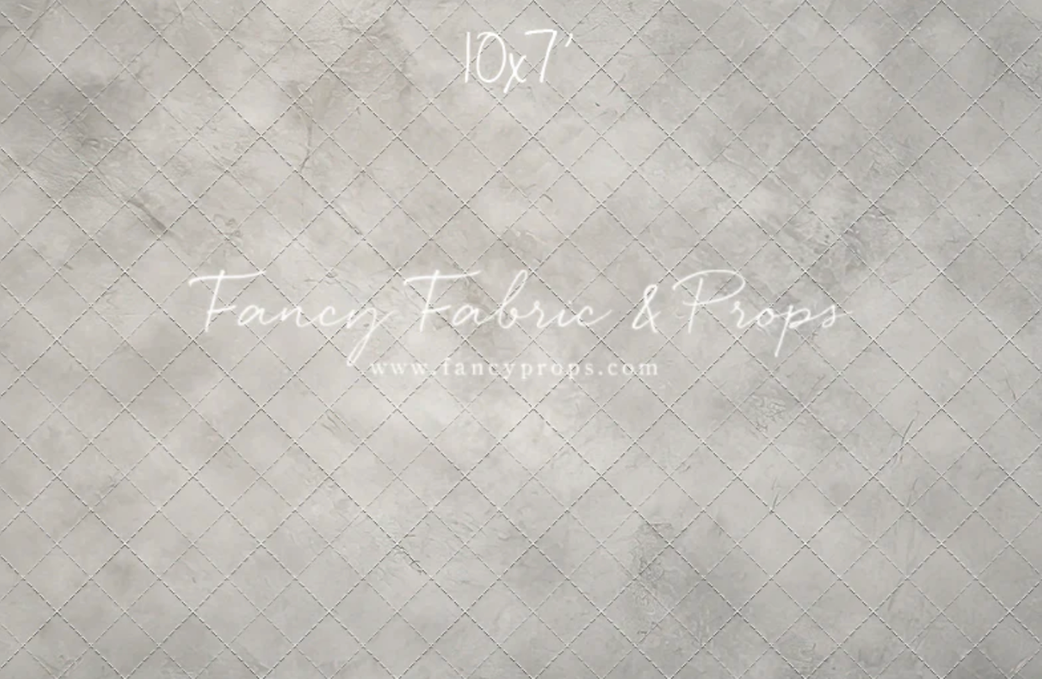 A black and white image with a faded text overlay showing "1027" and "Fancy Fabric & Props" in light gray lettering.