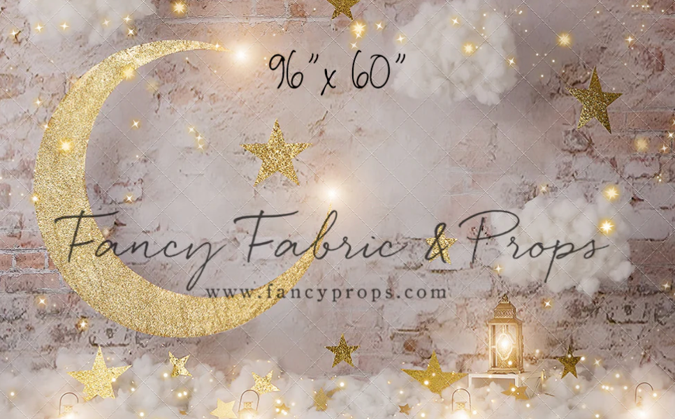 Dreamy celestial backdrop with golden crescent moon, glowing stars, and vintage lantern on misty gray background.