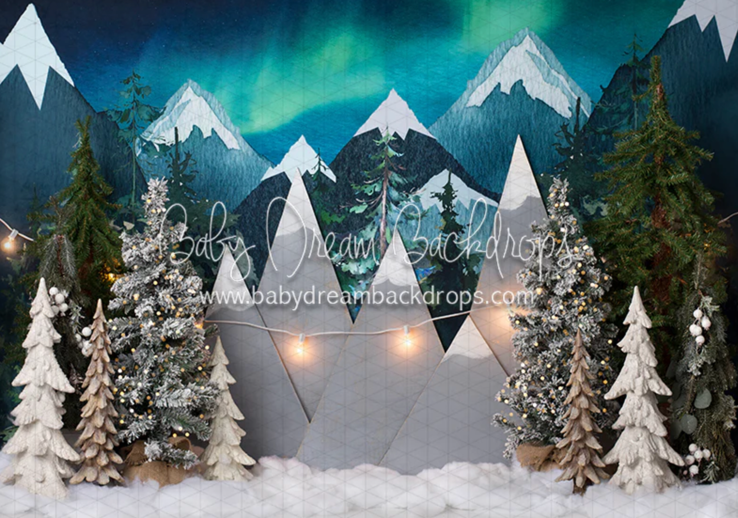 A winter wonderland scene with snow-covered evergreen trees against a backdrop of mountains and glowing aurora lights.