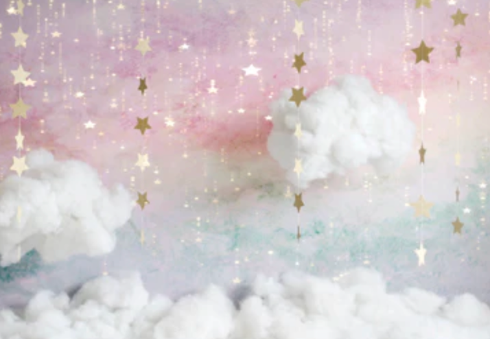 Pink and mint green clouds float beneath golden stars in a dreamy pastel sky background pattern.