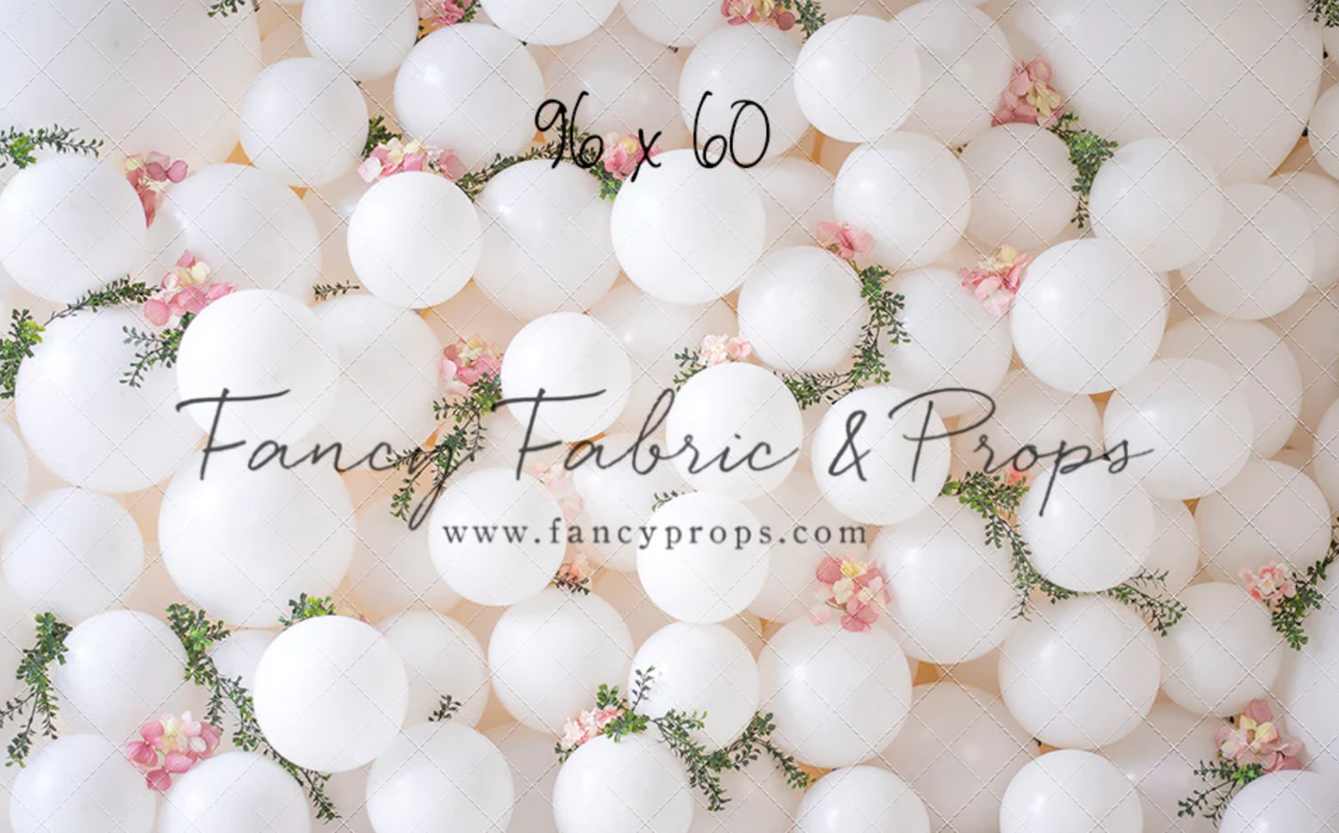 White balloon wall backdrop with delicate floral accents and text overlay for Fancy Props photography studio.
