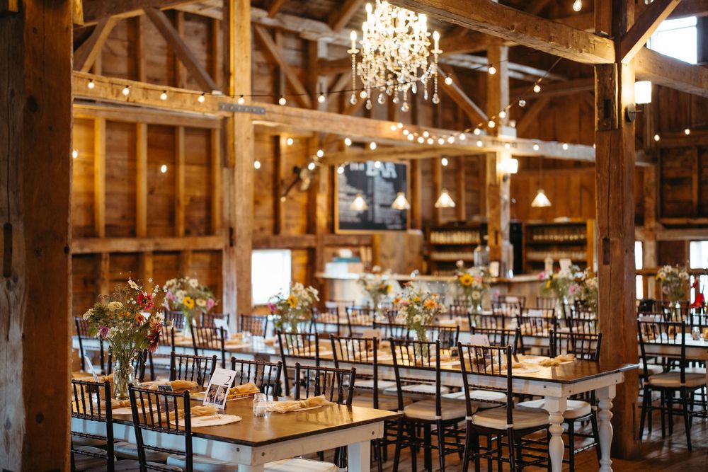rustic barn wedding decor wildflower theme in October at Ticklebelly Hill wedding photography New Brunswick Canada timeless photography