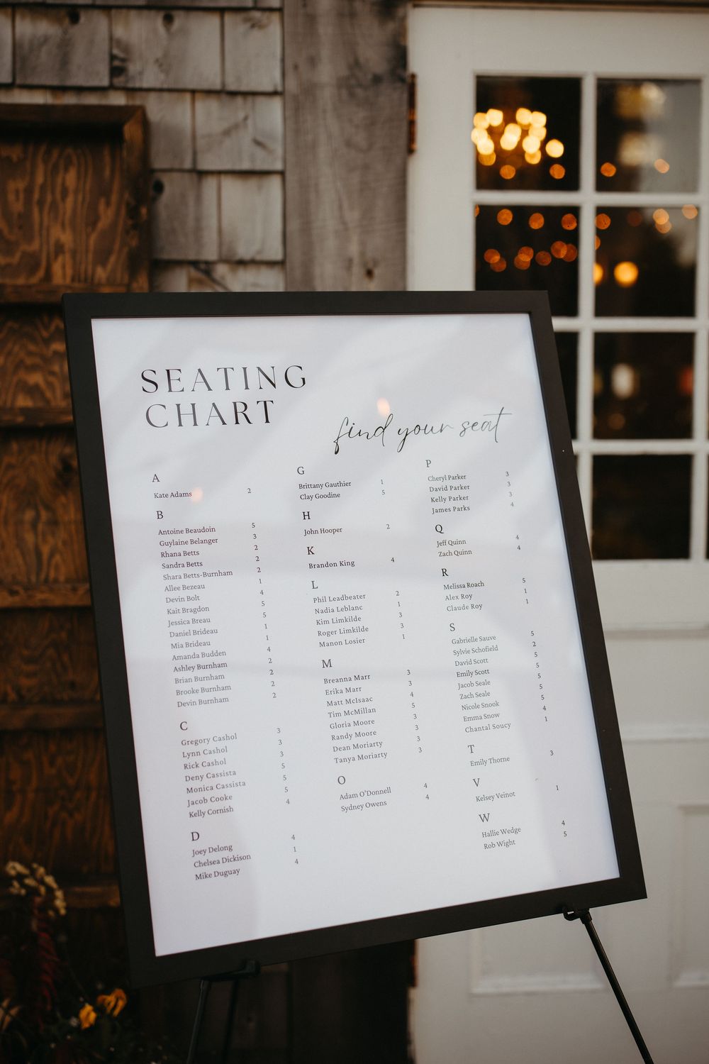 simple seating chart display at october Ticklebelly Hill wedding in St. Andrews New Brunswick wedding photographer, full day service package